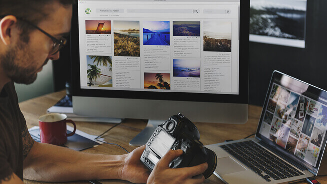 Man downloading his digital photographs